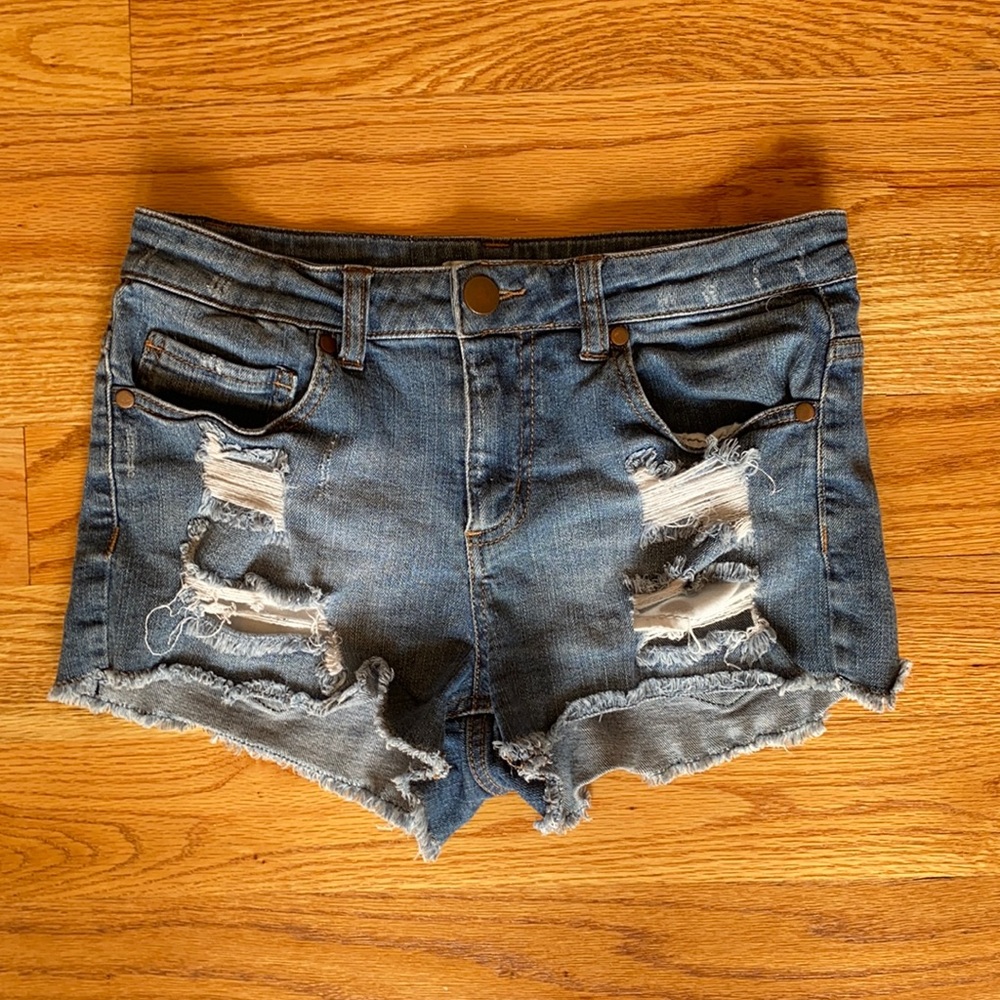 High rise distressed denim shorts